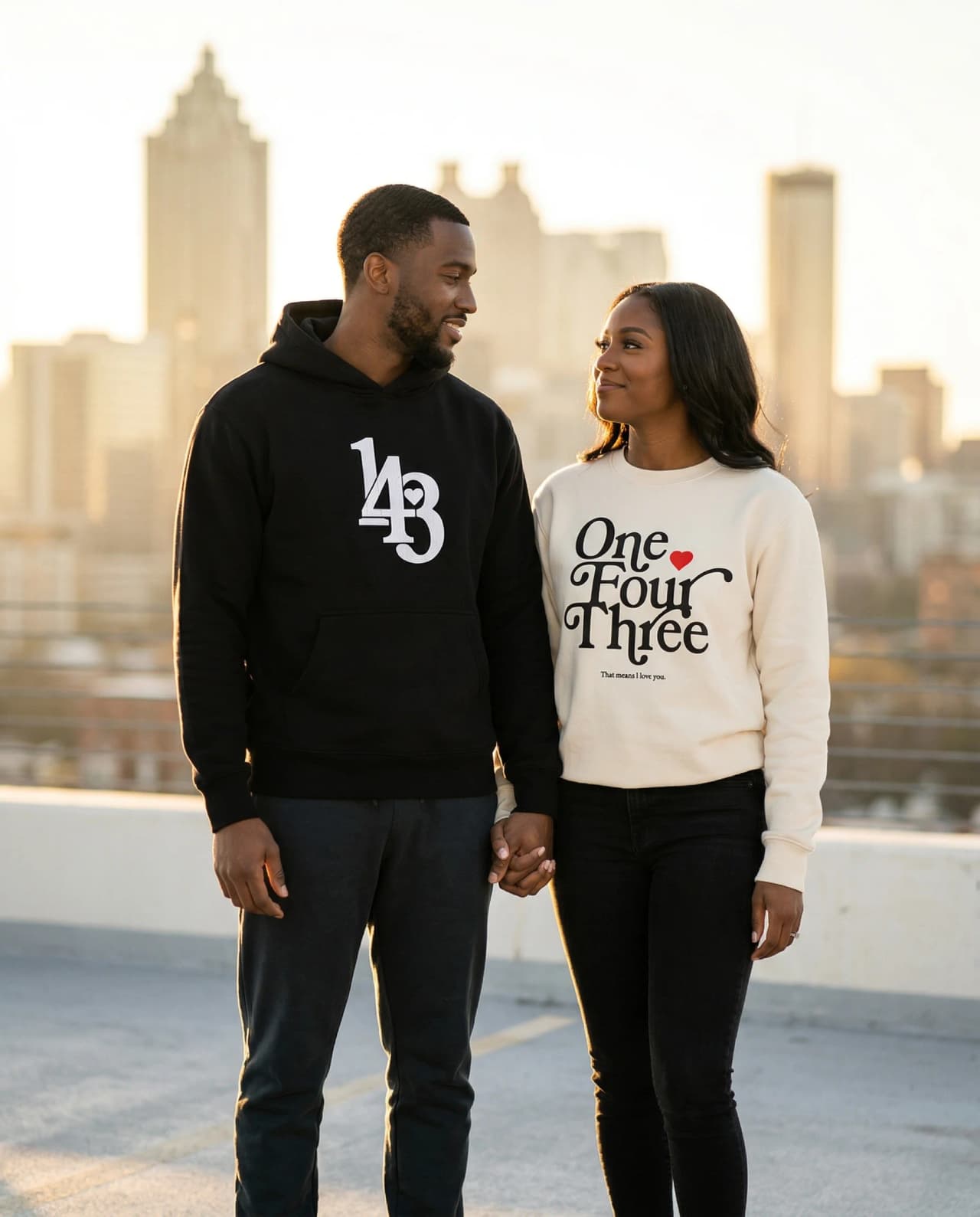 Black couple wearing 143 Collections premium apparel, photographed in Atlanta